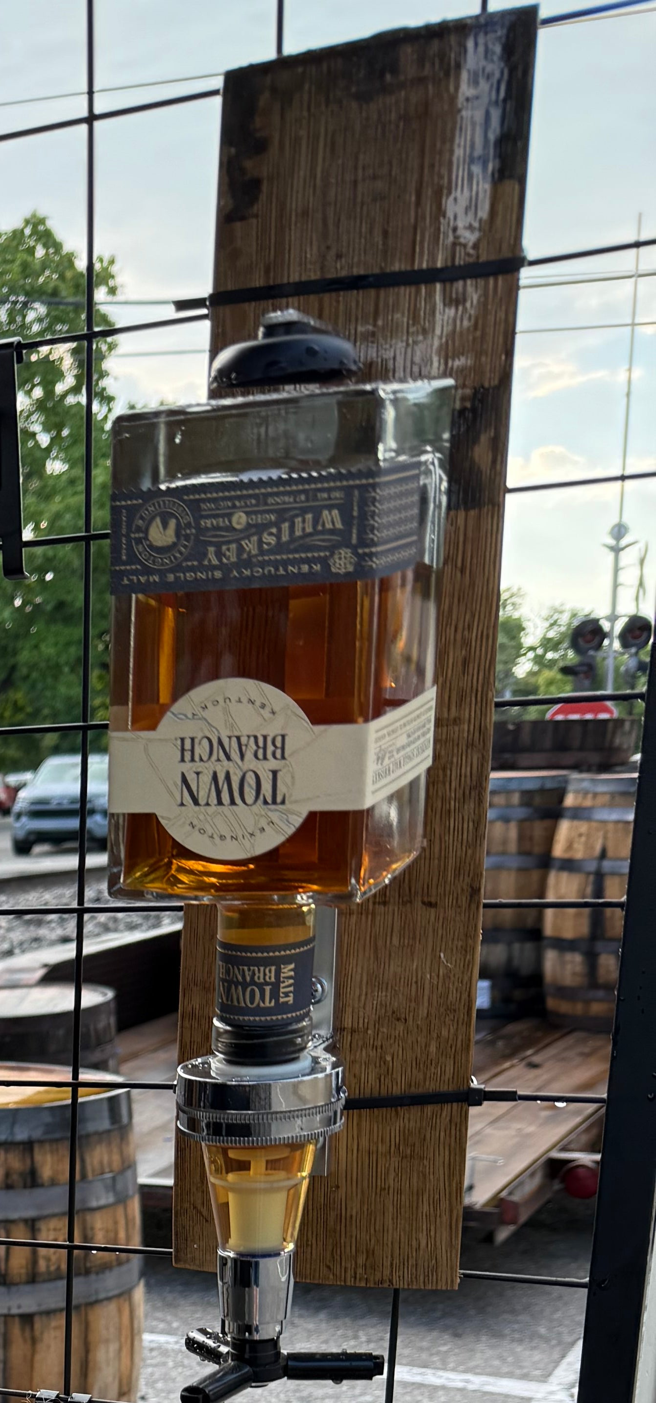 Wall mount liquor dispenser